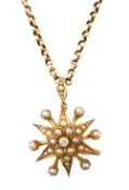 An Edwardian diamond and seed pearl starbust pendant/brooch