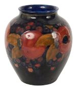 A Moorcroft pomegranate pattern vase