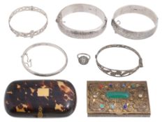 A group of hinge bangles and assorted items