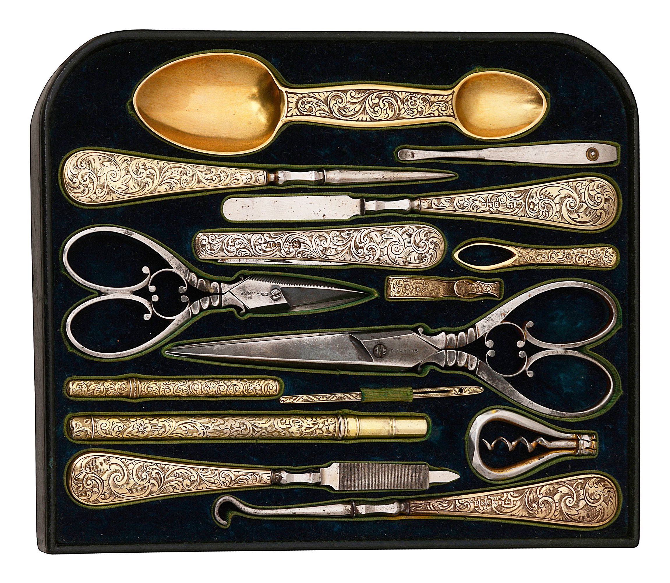 A mid Victorian fitted tray of mostly silver-gilt tools from a dressing box