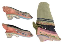 A Chinese plaster model of bound foot and a pair of lotus shoes