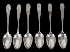 A set of six late Victorian Irish silver Celtic point dessert spoons