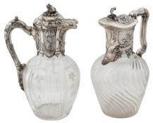 Two late Victorian silver mounted claret jugs