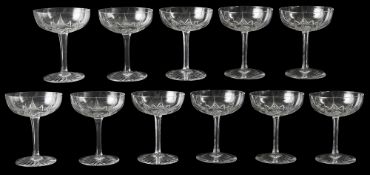 A set of eleven French cut crystal champagne coupes