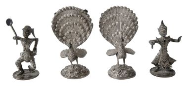 Two pairs of early 20th century Burmese silver figural menu holders