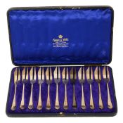 A George V cased set of twelve Queen Anne pattern pastry forks