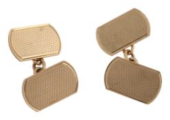 A pair of engine-turned 9ct gold cufflinks