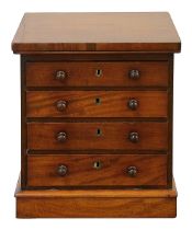 A Victorian miniature mahogany tabletop chest of drawers