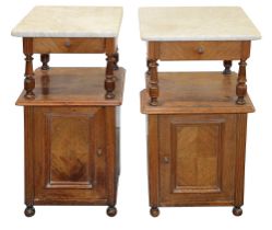 A pair of Louis Philippe walnut bedside cupboards
