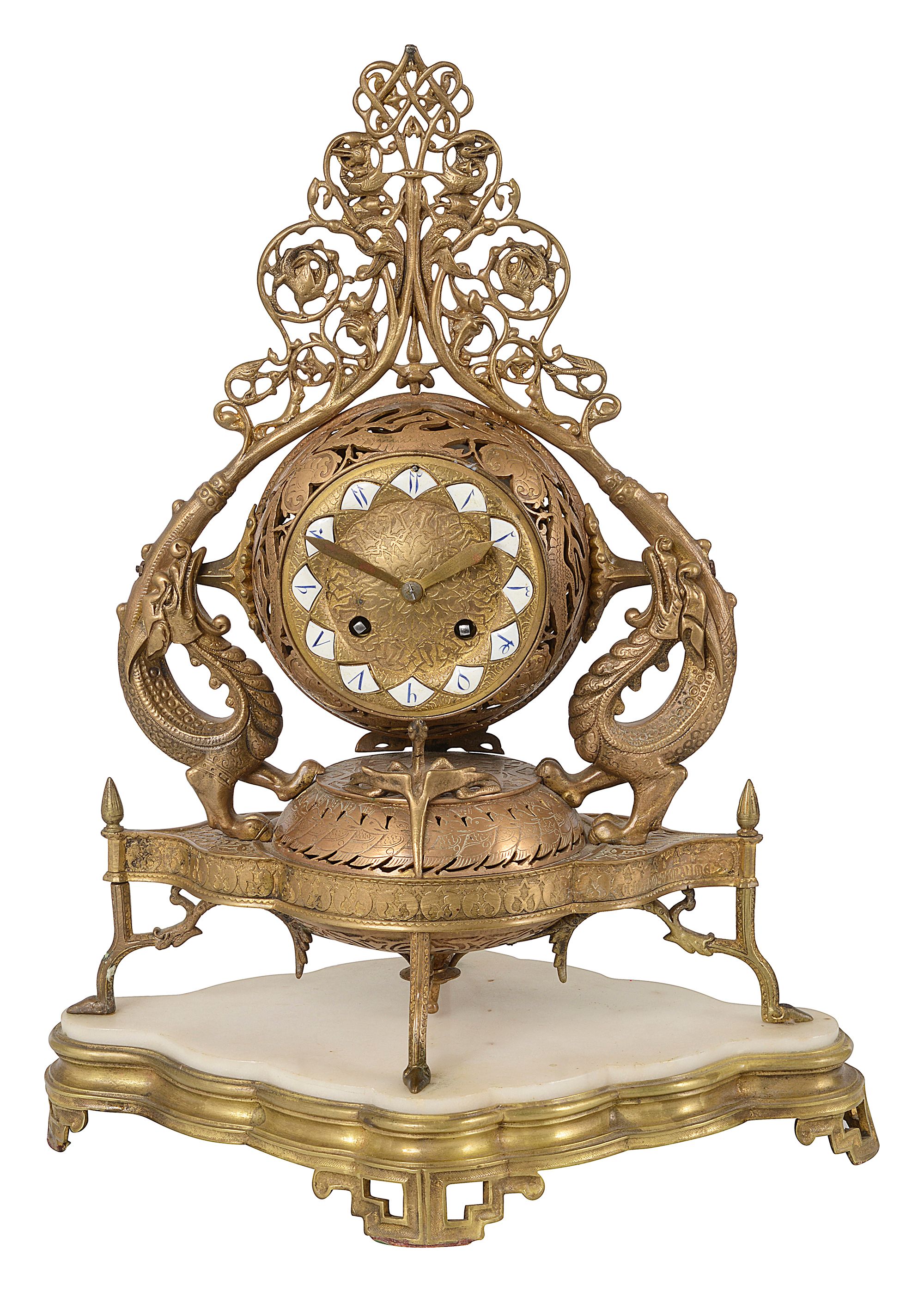 A French gilt bronze Persian style mantel clock