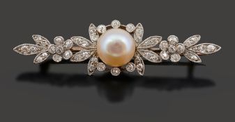 A cultured pearl and diamond-set brooch
