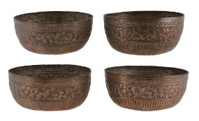 Four late 19th century South East Asian silver rice bowls