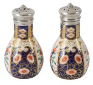 A pair of late Victorian silver mounted imari ceramic salt and pepper pots