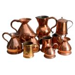 Five Victorian copper haystack measures, ale jugs and other copper