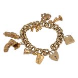 A 9ct gold fancy link charm bracelet