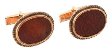A pair of carnelian set cufflinks