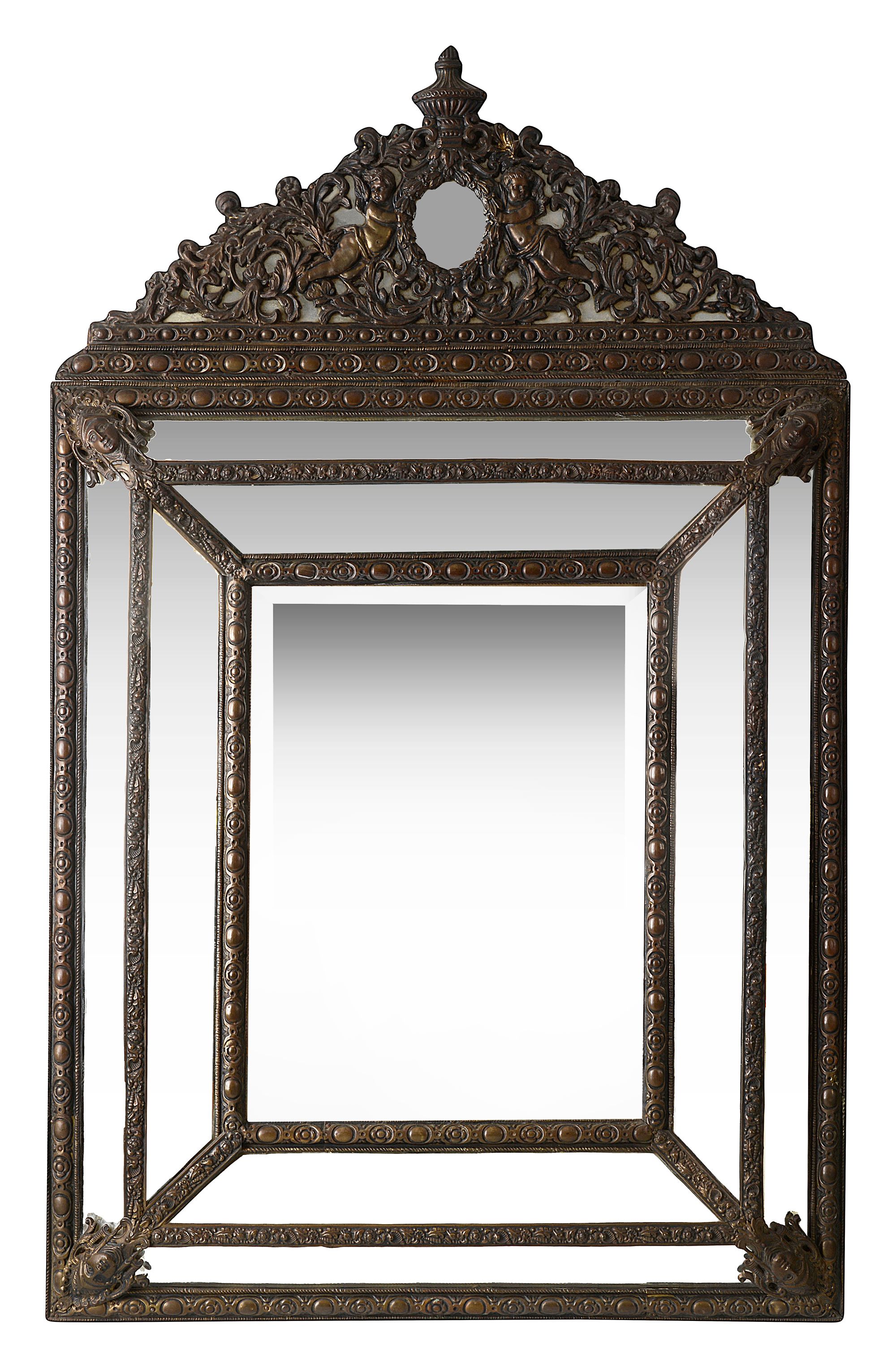 A large 19th century Flemish embossed brass wall mirror