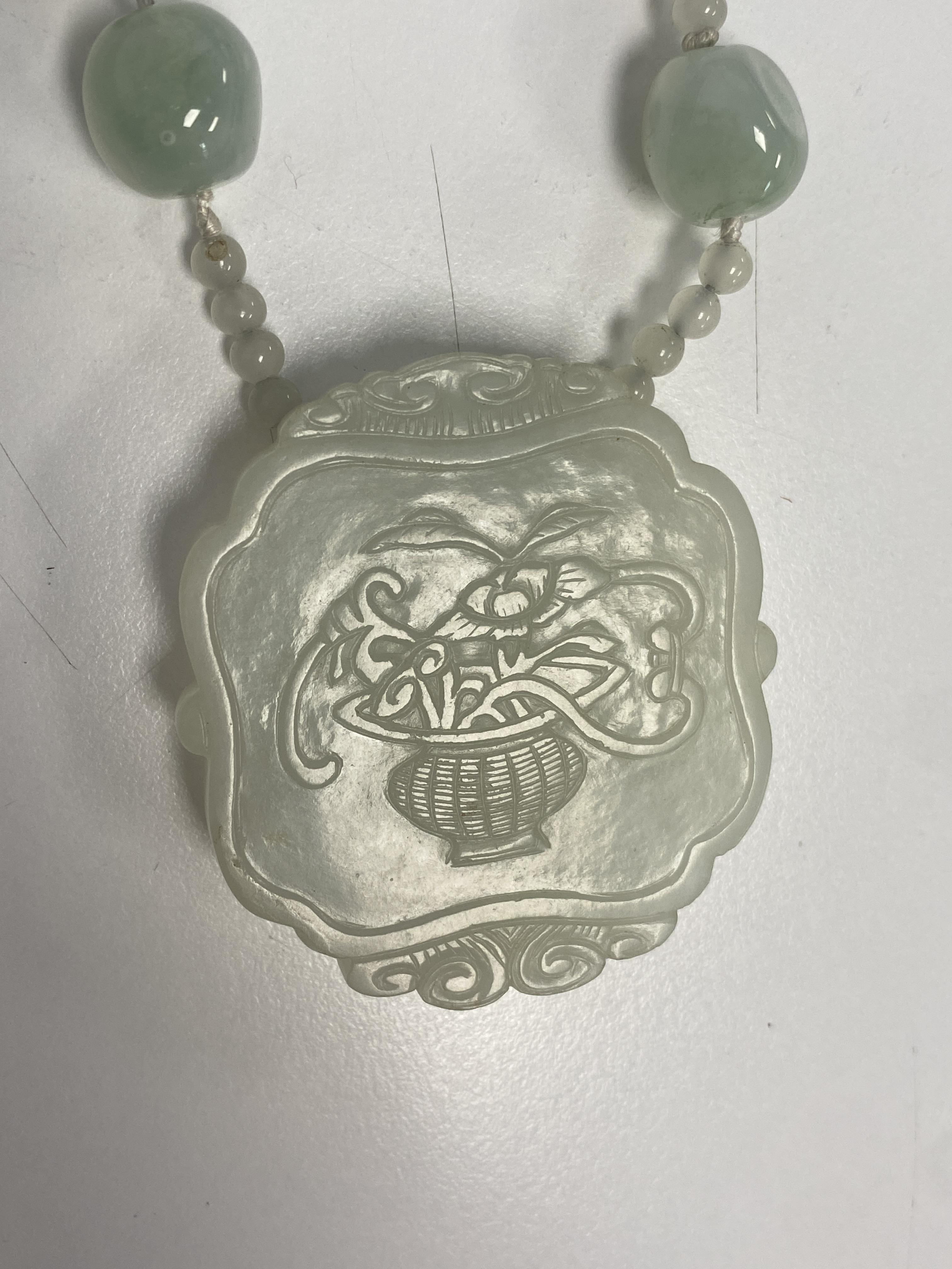 A Chinese mutton fat jade pendant necklace and five plaques - Image 12 of 29