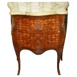 A Louis XV style kingwood and rosewood commode