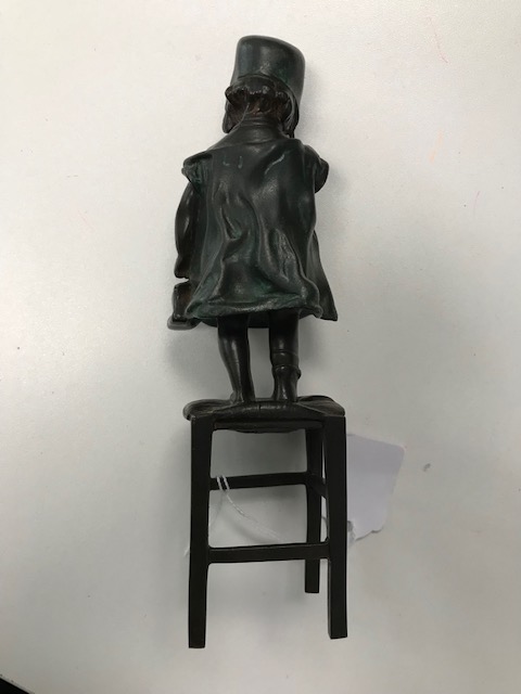 A bronze figure of a young girl standing on a stool - Image 4 of 4