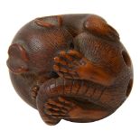 A 19th century Japanese Edo Period carved wood netsuke of a rat