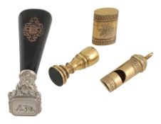 Two 19th century desk seals, a gilt dog whistle and matching case