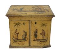 A Regency cream lacquered and gilt chinoiserie table top sewing cabinet