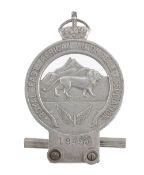 A Royal East African Automobile Association chrome car badge