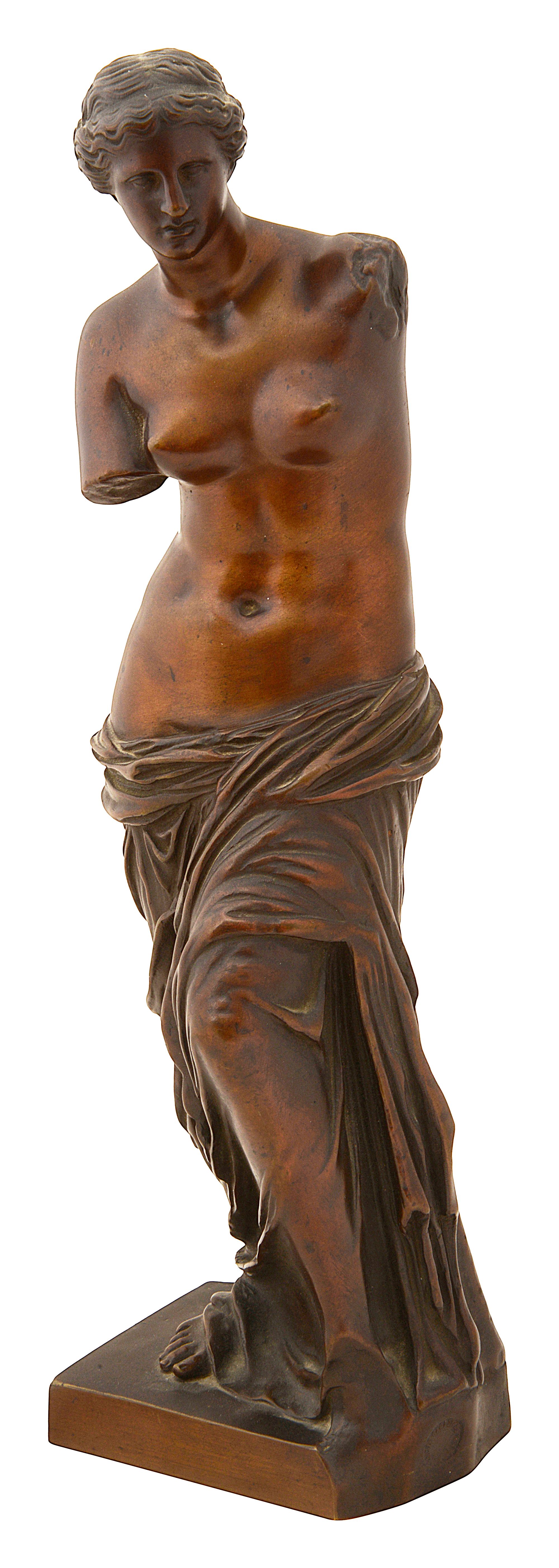 After the Antique. A 19th century French patinated bronze figure of the Venus de Milo