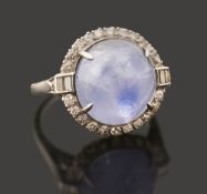 A star sapphire and diamond-set cluster ring