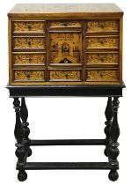 A South German walnut and marquetry cabinet on stand