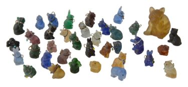 A collection of moulded frosted coloured glass animal charms c.1930