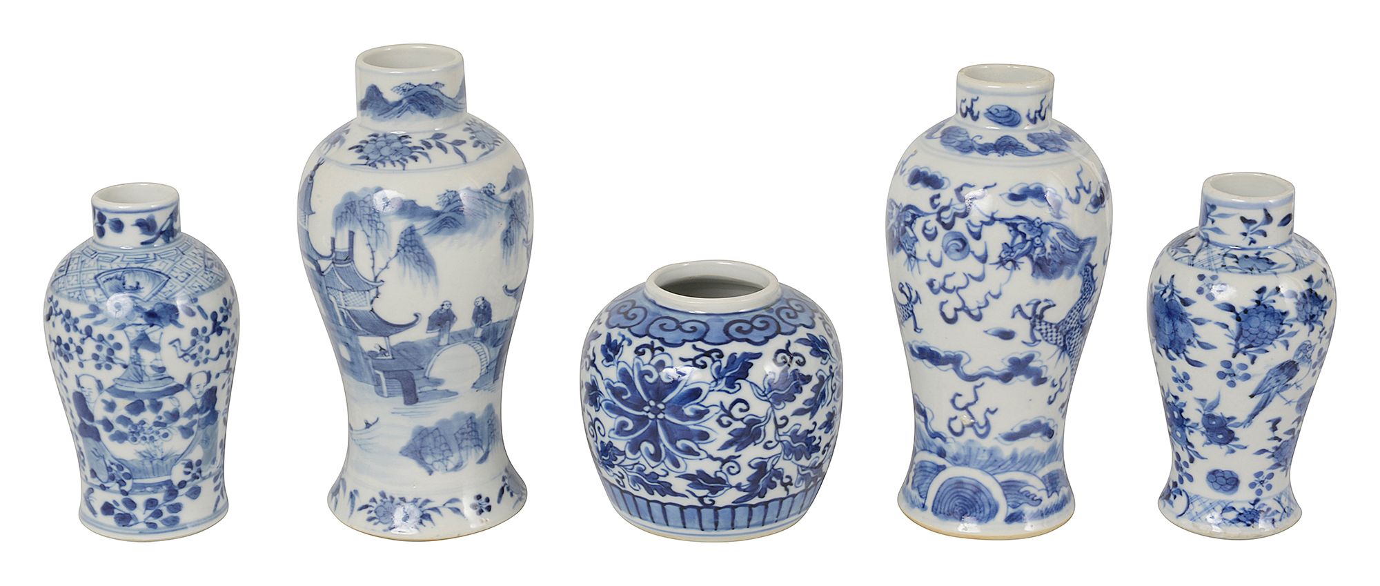 Four Chinese blue and white vases and a ginger jar