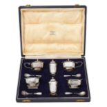 An Elizabeth II cased silver six piece cruet set