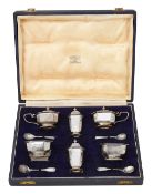 An Elizabeth II cased silver six piece cruet set