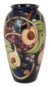 A Moorcroft Queens Choice pattern vase