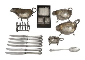 A group of three silver sauceboats