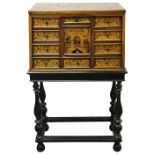 A South German walnut and marquetry cabinet on stand