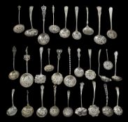 A collection of late Victorian and Edwardian silver sifter spoons