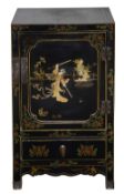 A Chinese black lacquer cabinet