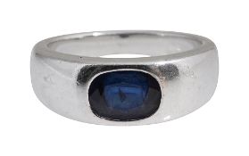 A sapphire gypsy ring