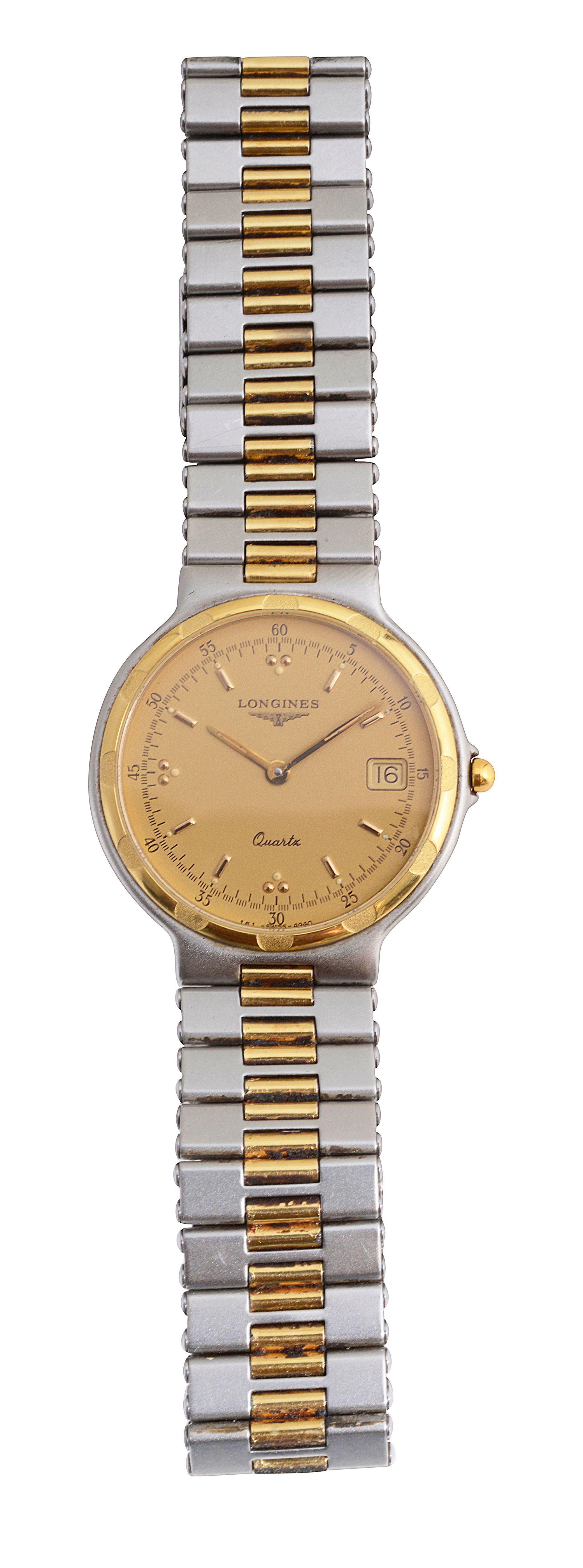 A gentleman Longines stainless steel and goldplated "conquest" quartz wristwatch