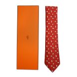 An Hermes red silk tie