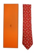 An Hermes red silk tie