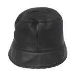 A Chanel black leather reversible CC logo hat