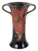 A William Moorcroft pomegranate pattern twin handled vase