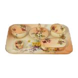 A Royal Worcester blush ivory six piece dressing table set