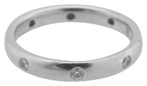 A platinum and gem set ring