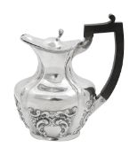 A late Victorian silver small hot water jug