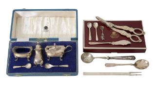 An Elizabeth II pair of silver grape shears, cased silver three piece cruet set and other silver